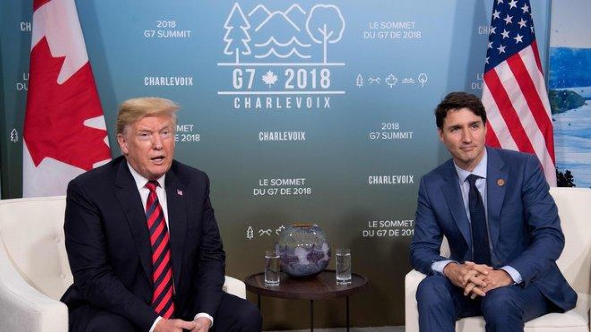 Donald Trump y Justin Trudeau.-AFP