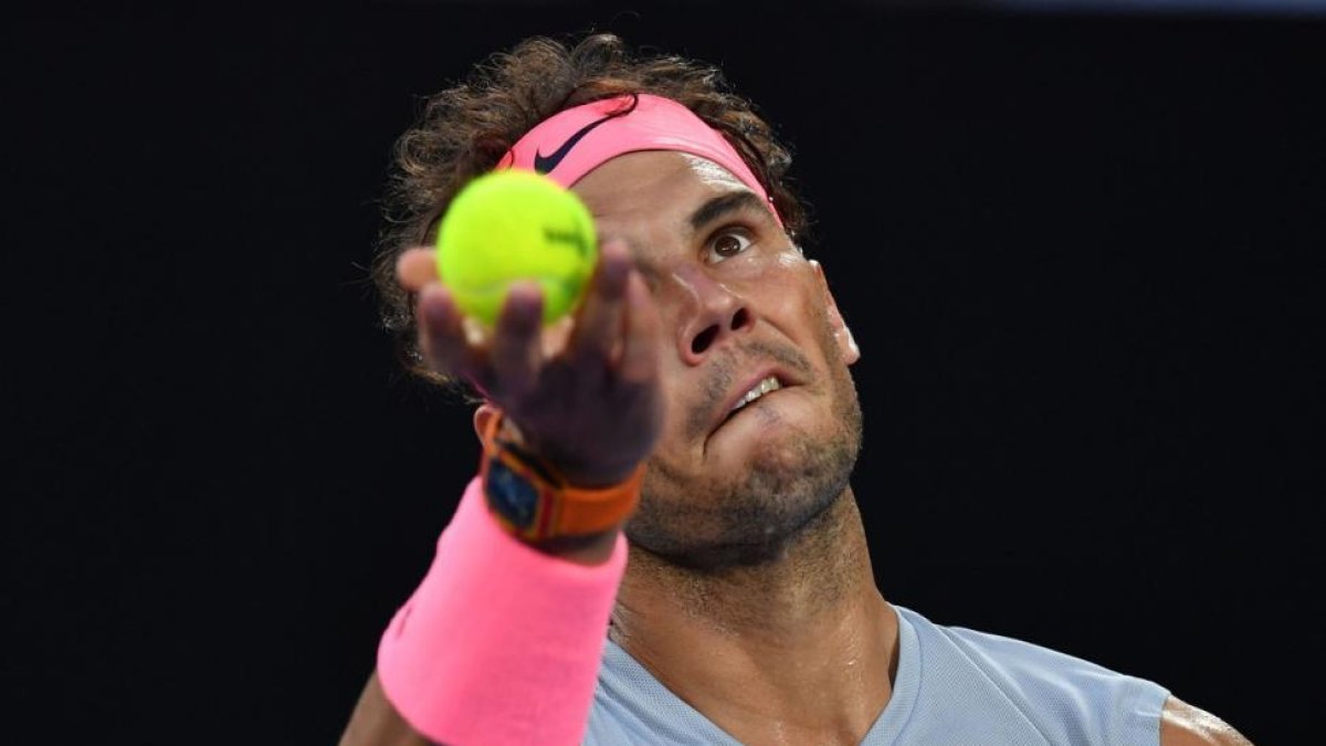 Rafael Nadal, concentrado, ante Cilic.-AFP / PAUL CROCK