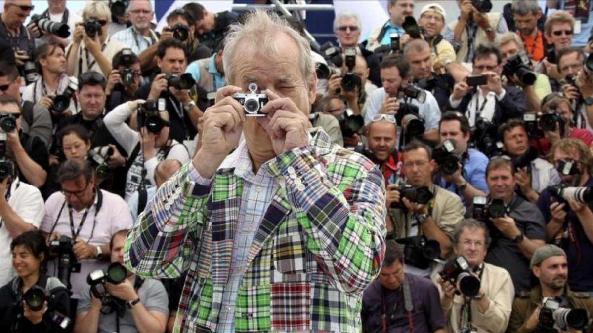 El actor Bill Murray, con una minicámara, en el 65º festival de cine de Cannes.-AP / JOEL RYAN