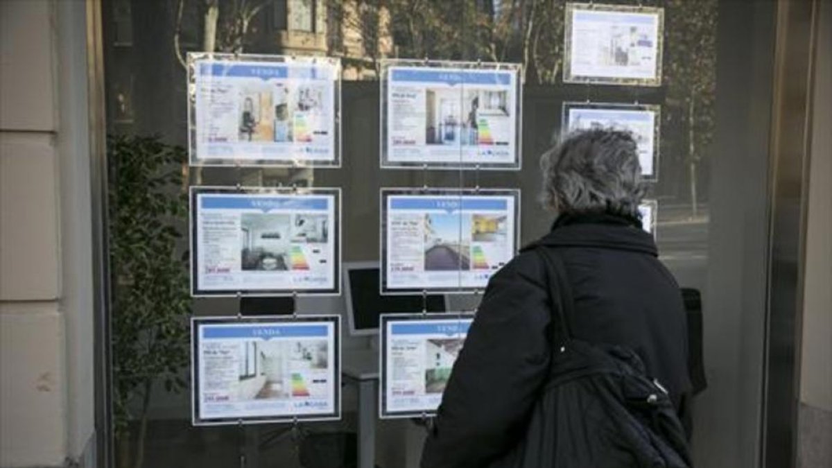 Inmobiliaria de compraventa de pisos y locales.-JOAN CORTADELLAS