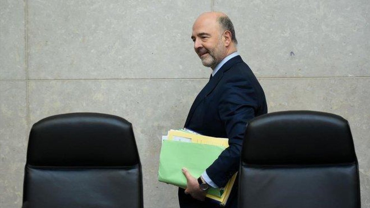 El comisario de Economía, Pierre Moscovici.-JOHN THYS (AFP)