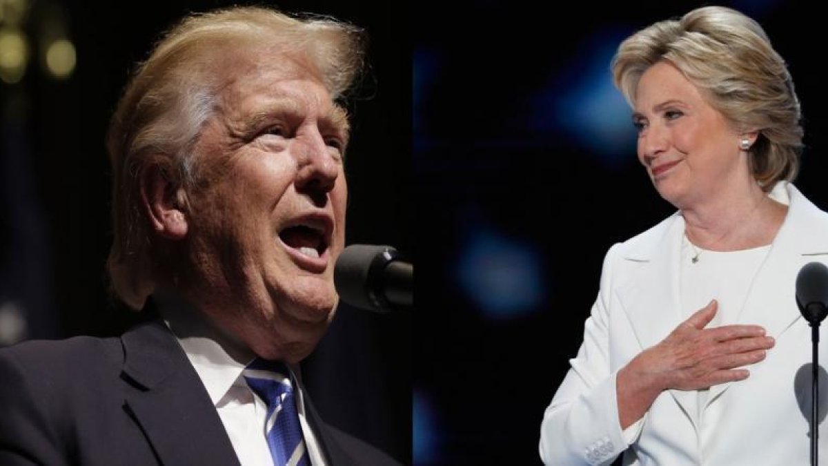 Los candidatos a la presidencia de EEUU, Donald Trump y Hillary Clinton.-AFP / JOSHUA LOTTAP Y AP / J. SCOTT APPLEWHITE
