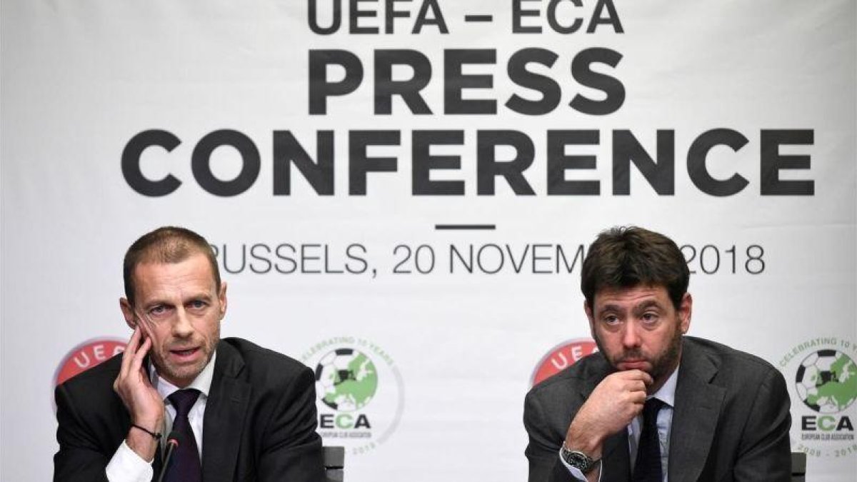 El presidente de la UEFA, Ceferin, y el de la ECA, Andrea Agnelli, en una reunión en Bruselas en 2018-JOHN THYS (AFP)