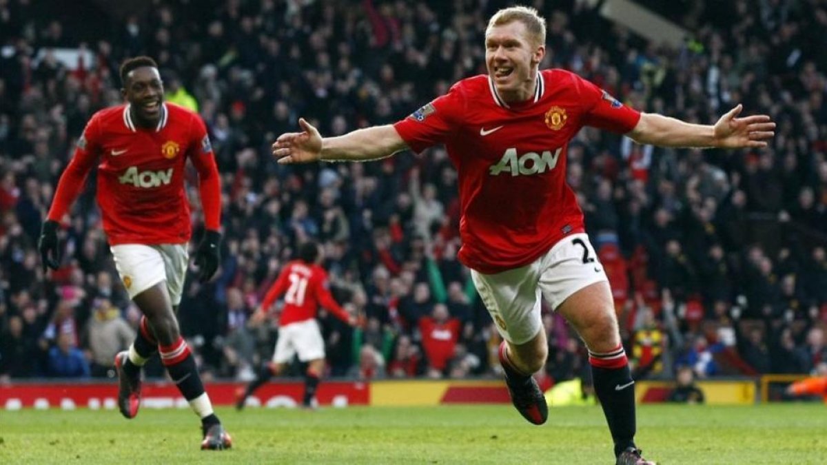 Paul Scholes celebra un gol con el Manchester United.-TIM HALES