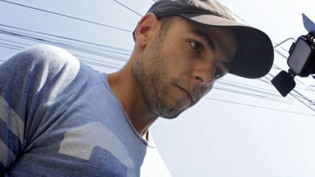 Sergio Morate, el 14 de agosto, llegando escoltado al tribunal rumano de Lugoj.-Foto: EFE / ADRIAN PICLISAN