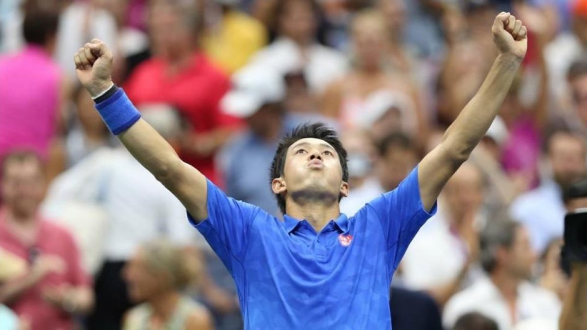 Nishikori celebra la victoria ante Murray que le ha dado el paso a semifinales del Abierto de EEUU.-JERRY LAI