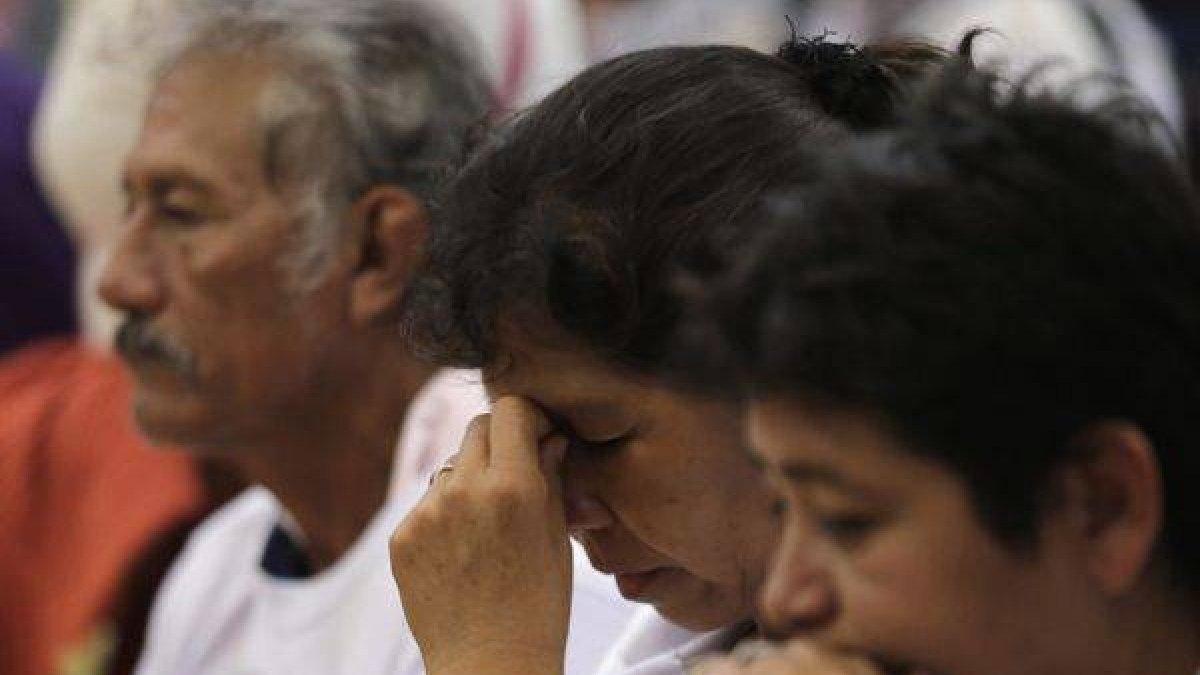 Familiares de los estudiantes desaparecidos participan en una misa, el martes en Chilpancingo, en el estado de Guerrero.-Foto: REUTERS / HENRY ROMERO