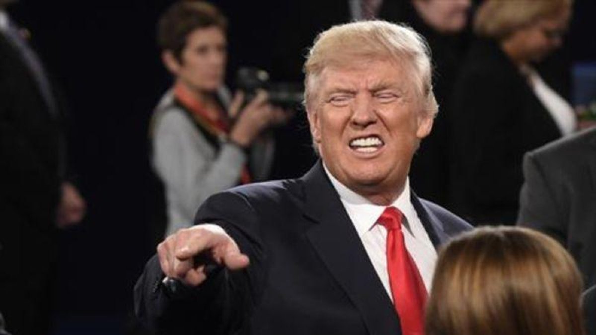 Trump, en el último debate con Clinton.-AFP / SAUL LOEB