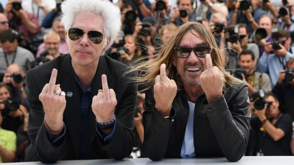 Jim Jarmusch (izquierda) e Iggy Pop, en Cannes, en la presentación del documental 'Gimme danger'.-AFP / ANNE-CHRISTINE POUJOULAT