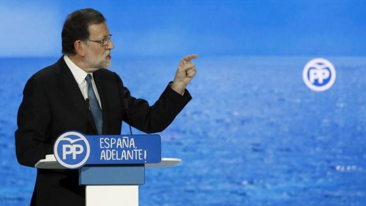 Mariano Rajoy, durante su intervención de este sábado en el congreso del PP.-EFE / JUANJO MARTIN