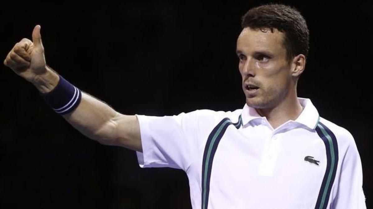 Bautista Agut celebra su victoria ante Klizan en la primera ronda de Australia.-AP / RAFIQ MAQBOOL