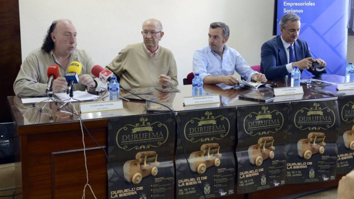 Carlos Mazo, Román Martín, Víctor Mateo y José Luis Lázaro, en la presentación de la Feria de la Madera de Duruelo.-A.M.