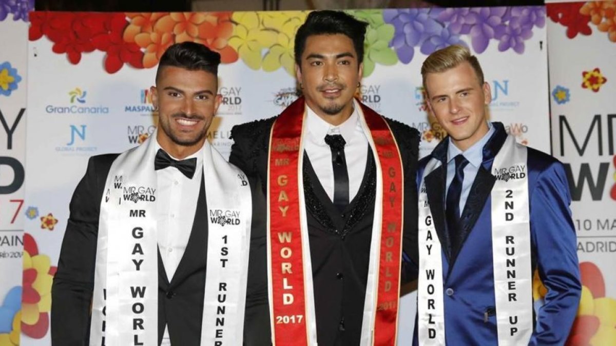 El filipino John Fernández, el español Candido Arteaga (segundo clasificado) y el belga Raf Vas Puymbroek (tercer clasificado).-EFE