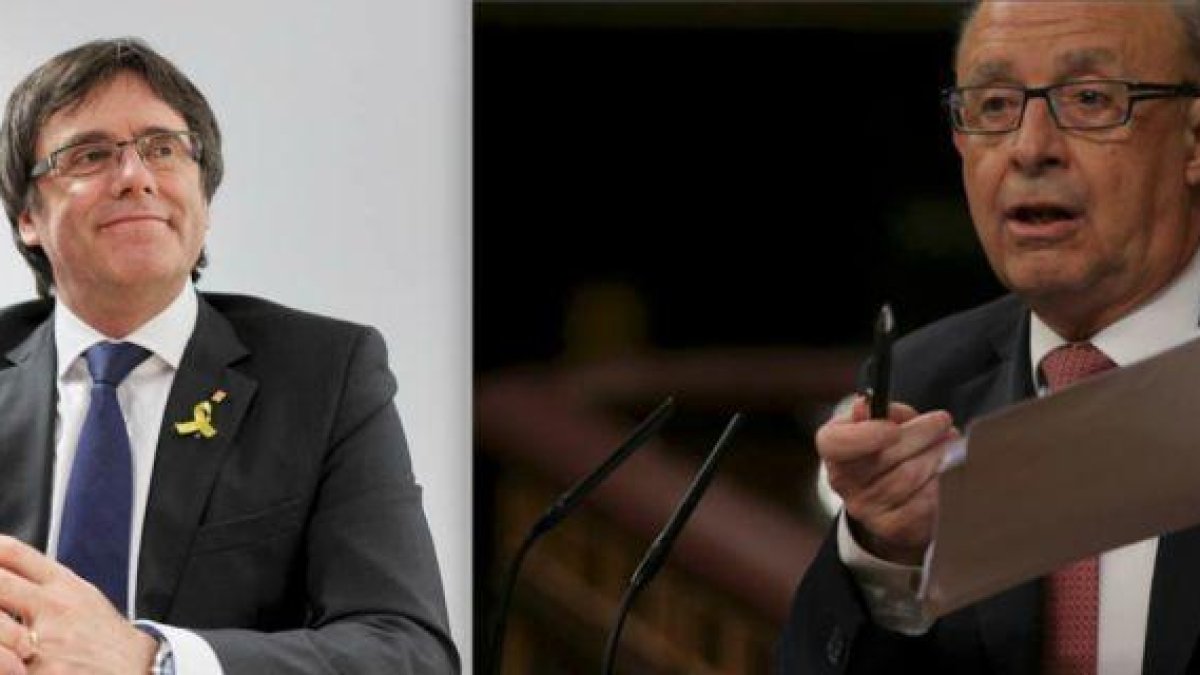 A la izquierda, Carles Puigdemont, expresident de la Generalitat. A la derecha, Cristóbal Montoro, ministro de Hacienda-EL PERIÓDICO
