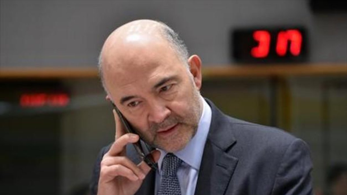 Pierre Moscovici, comisario de Asuntos Económicos, ayer en Bruselas.-AFP / JOHN THYS