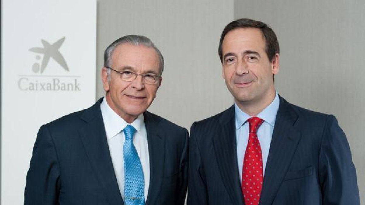 Isidre Fainé y Gonzalo Gortázar, de CaixaBank.-