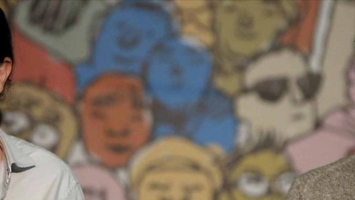 Iglesias y Errejón durante un acto de 'El Congreso en tu plaza' en Vallecas (Madrid).-JOSE LUIS ROCA