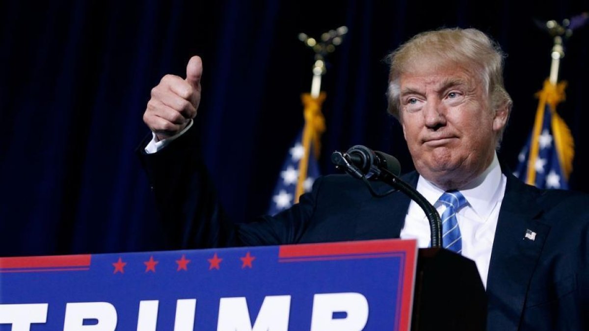 El candidato republicano Donald Trump ha vuelto a cargar contra los simpapeles en Phoenix.-AFP