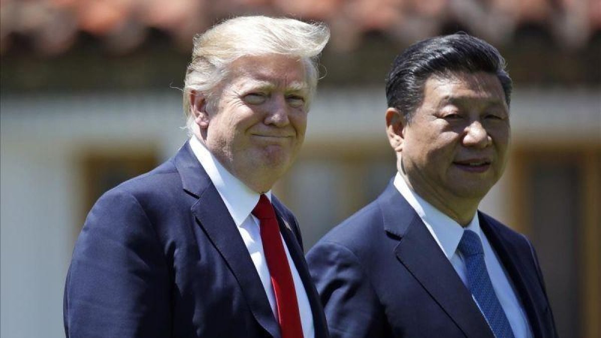 Trump y Xi Jinping.-AP / ALEX BRANDON