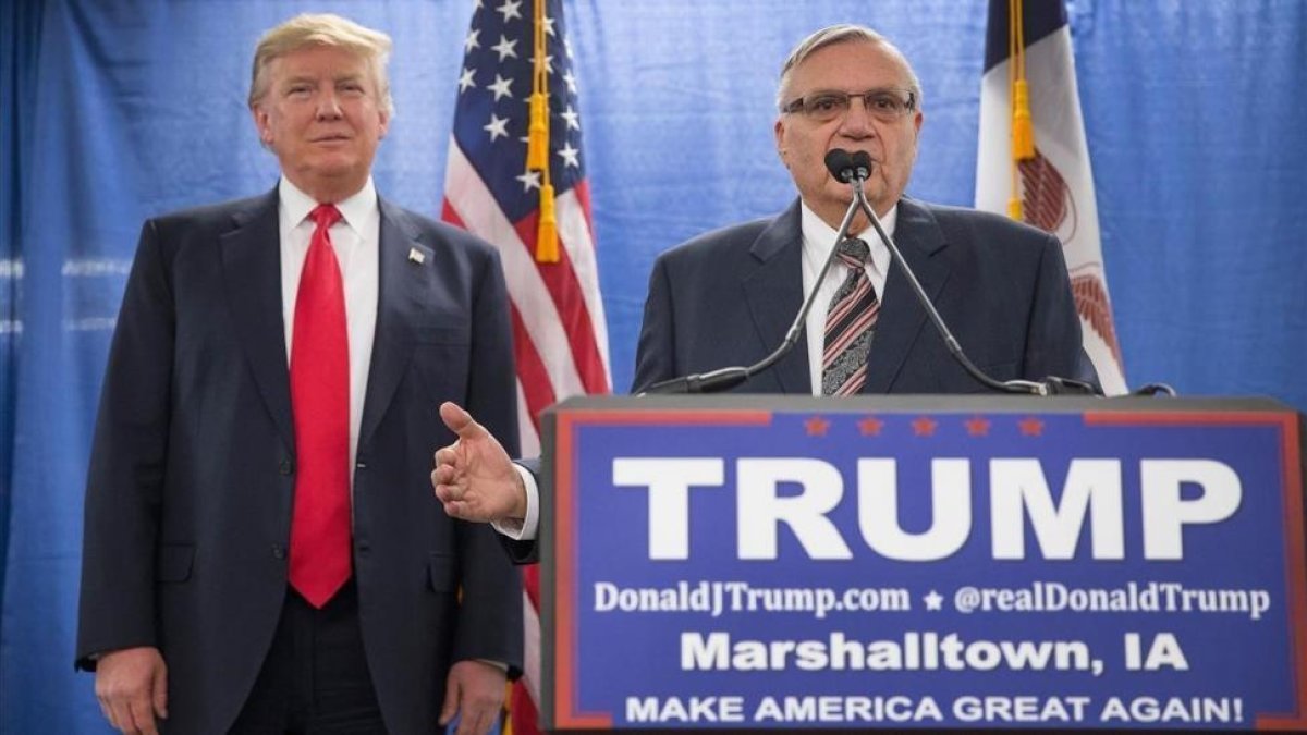 El exsheriff Joe Arpaio y Donald Trump-AFP / SCOTT OLSON