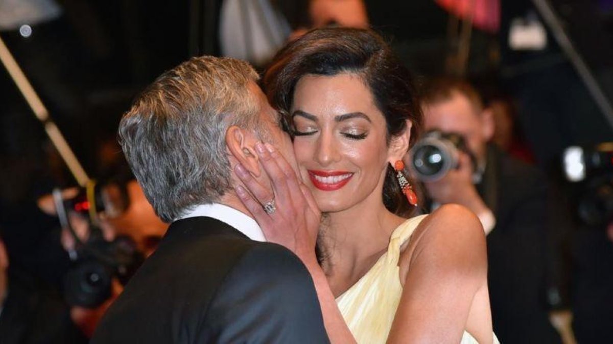 George y Amal Clooney, el pasado mayo en Cannes.-AFP / LOIC VENANCE