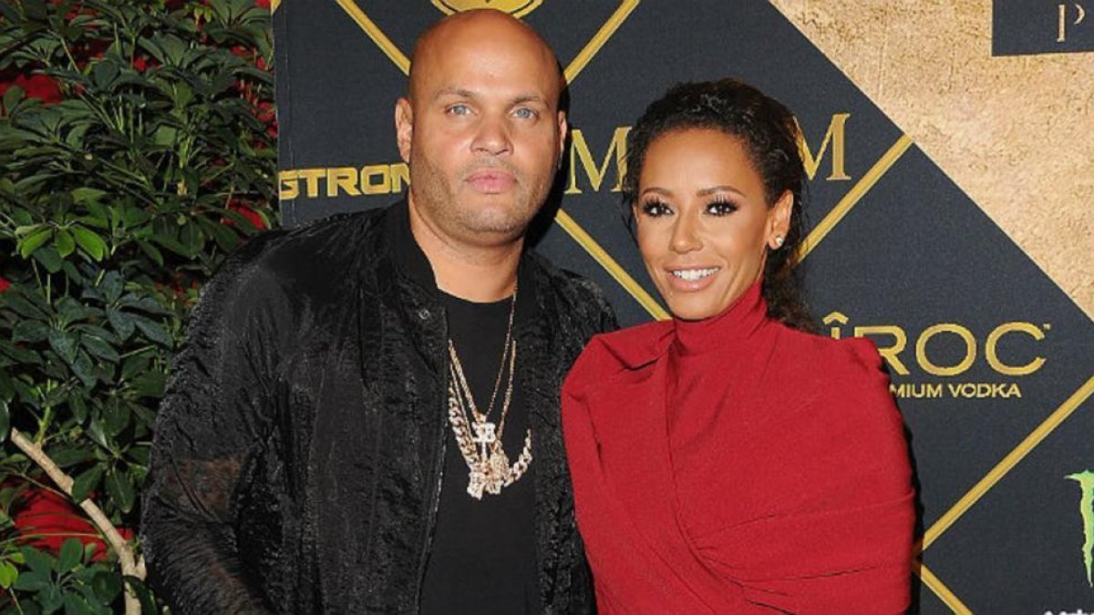 Mel B y su entonces marido Stephen Belafontem, en julio del año pasado, en Los Ángeles.-JON KOPALPFF