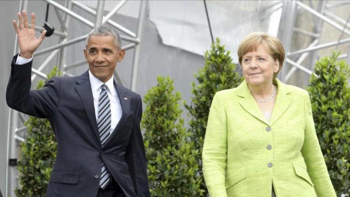 Obama y Merkel, en Berlín.-EFE / CLEMENS BILAN