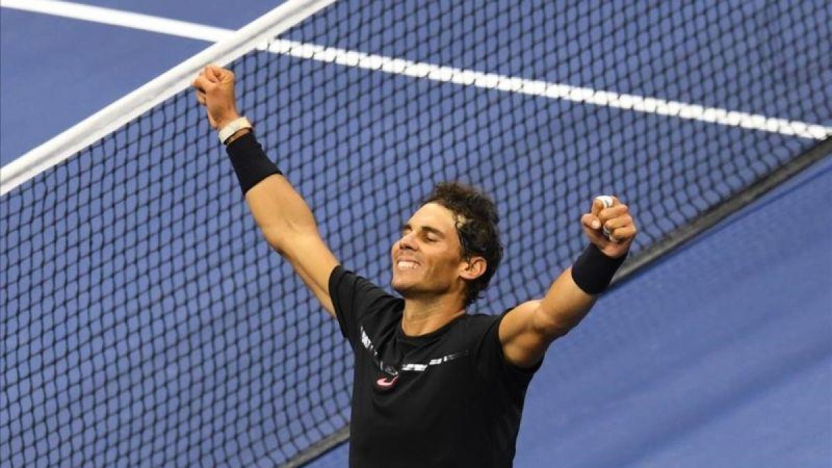 Nadal celebra el pase a la final del Open USA tras su triunfo ante Del Potro.-AFP / DON EMMERT