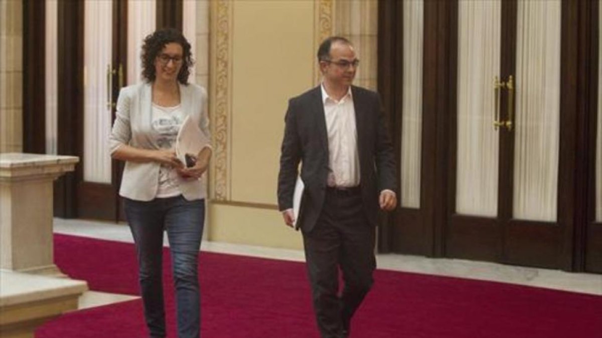 Marta Rovira y Jordi Turull, en el Parlament.-DANNY CAMINAL
