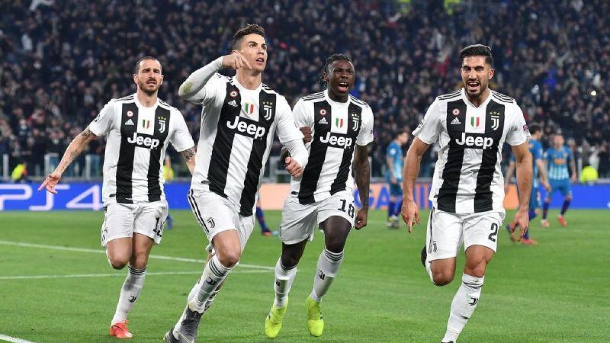 Cristiano Ronaldo y sus compañeros, en plena euforia tras marcar al Atlético.-ANSA / EPA