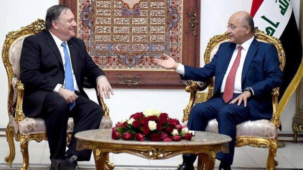 El secretario de Estado de EEUU, Mike Pompeo, y el presidente iraquí, Baham Saleh.-EFE