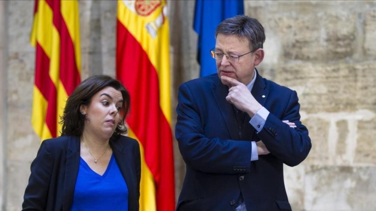 La vicepresidenta del Gobierno, Soraya Sáenz de Santamaría, y el presidente de la Generalitat Valenciana, Ximp Puig, este martes, 31 de enero, en Valencia.-MIGUEL LORENZO