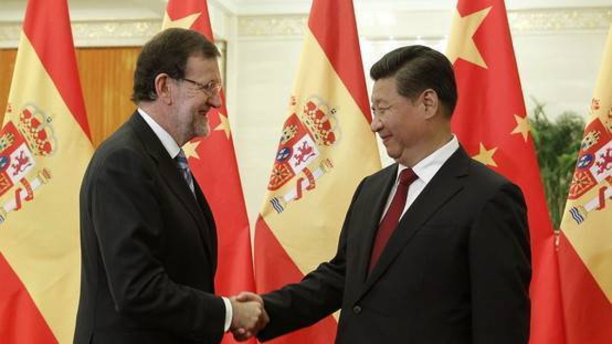 Mariano Rajoy saluda al presidente chino, Xi Jinping, en septiembre del 2014.-Foto: EFE