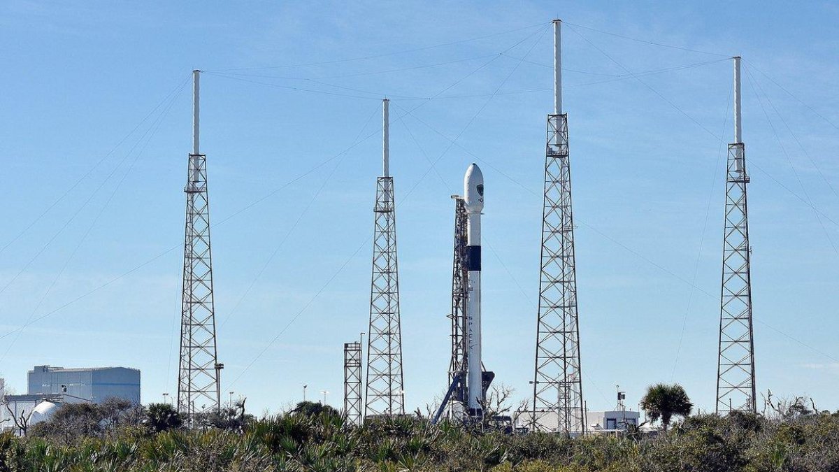 The SpaceX Falcon 9 rocket  scheduled to launch a U S  Air Force navigation satellite  sits on Launch Complex 40 after the launch was postponed after an abort procedure was triggered by the onboard flight computer  at Cape Canaveral-REUTERS