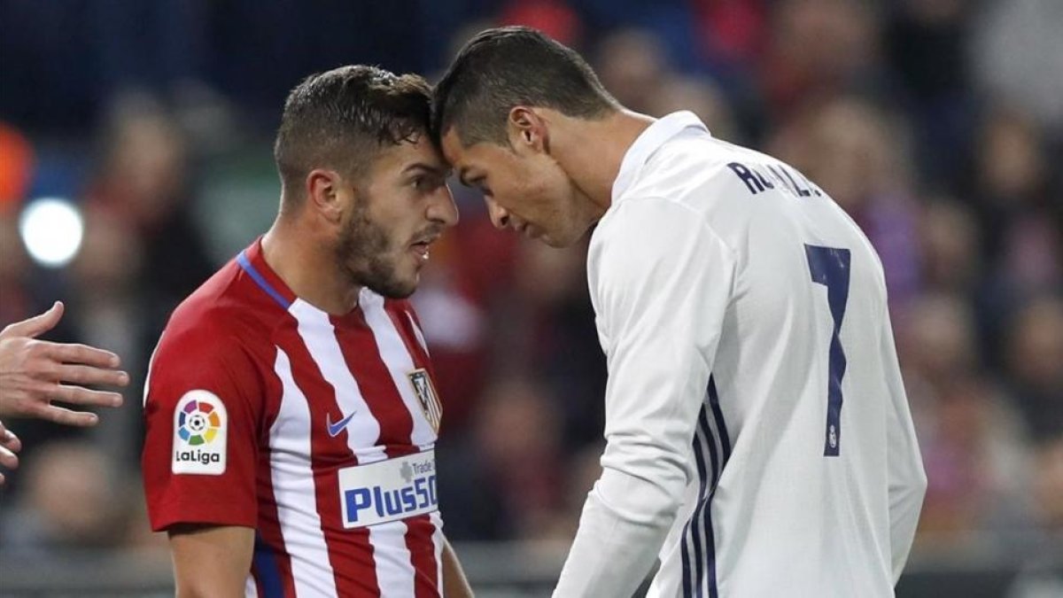 Koke y Cristiano Ronaldo, encarados en el derbi del pasado sábado.-EFE / CHEMA MOYA