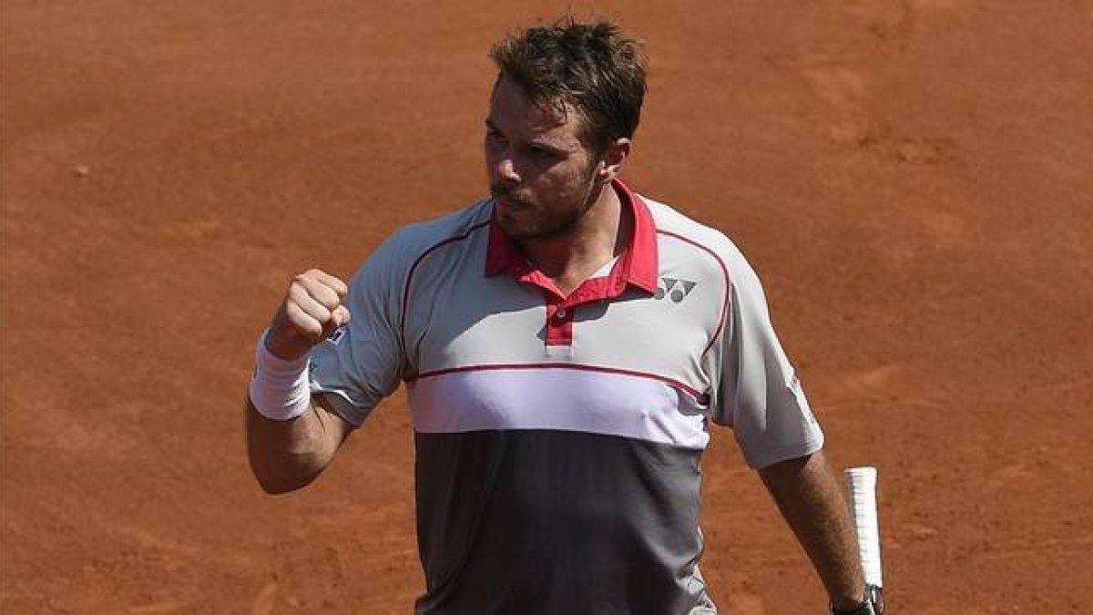 Wawrinka celebra un punto ante Tsonga.-Foto: AFP / MIGUEL MEDINA