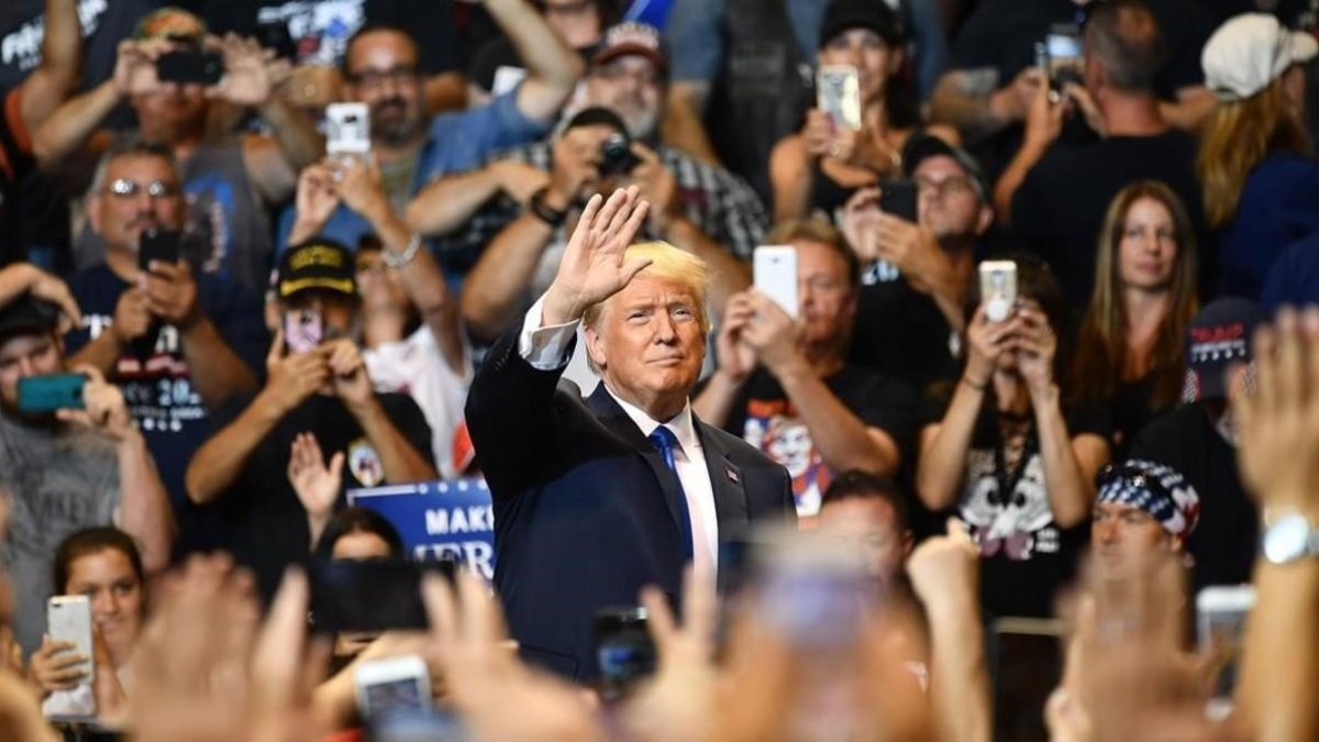 Simpatizantes de Trump le jalean a su llegada a un mitin en Pensilvania.-MANDEL NGAN (AFP)