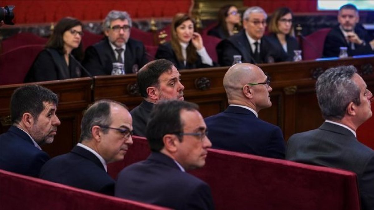 Jordi Sànchez, Jordi Turull, Josep Rull y Oriol Junqueras durante el juicio del procés en el Tribunal Supremo.-EMILIO NARANJO / EFE