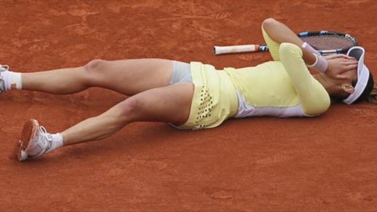 Garbiñe Muguruza, instantes después de lograr su mejor triunfo.-AP / DAVID VINCENT