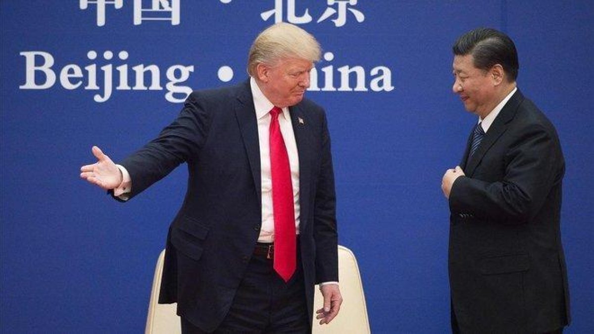 La guerra comercial entre China y EE.UU podría afectar las economías de otras naciones en el mundo.-