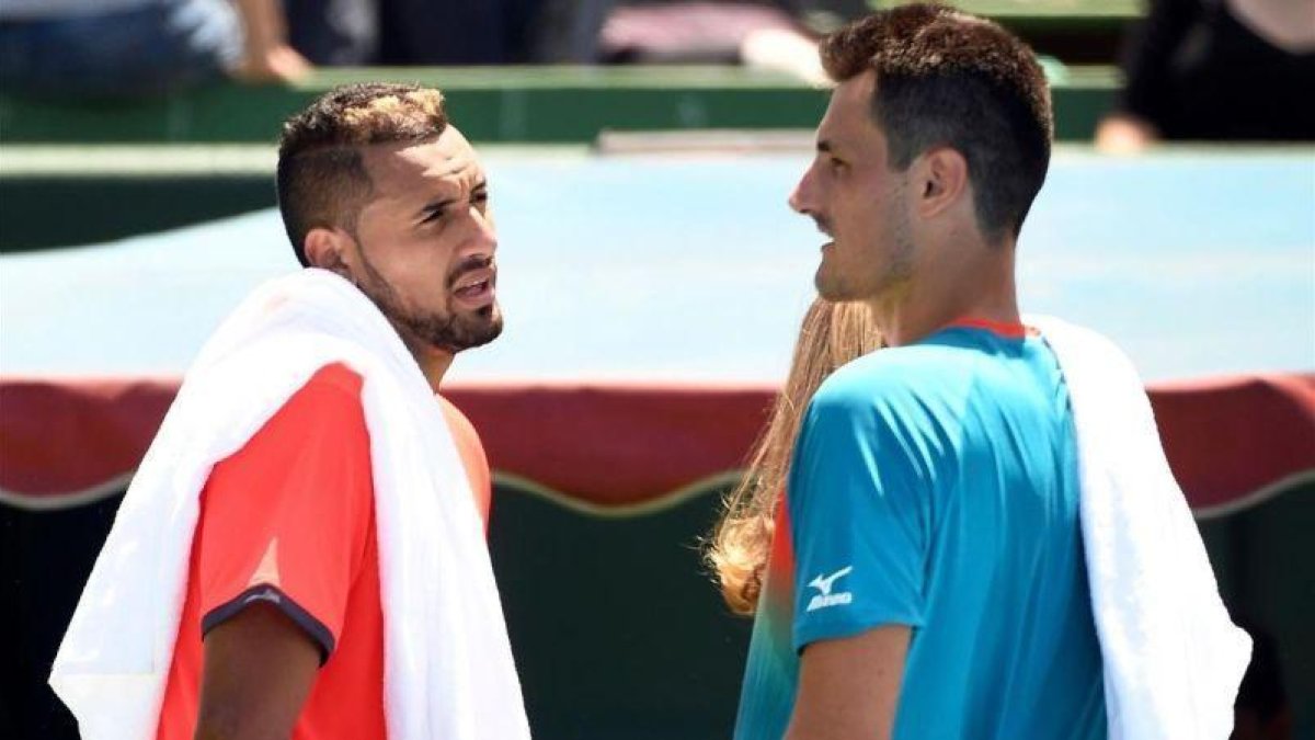 Kyrgios y Tomic, tras su exhibición en Kooyong.-AFP