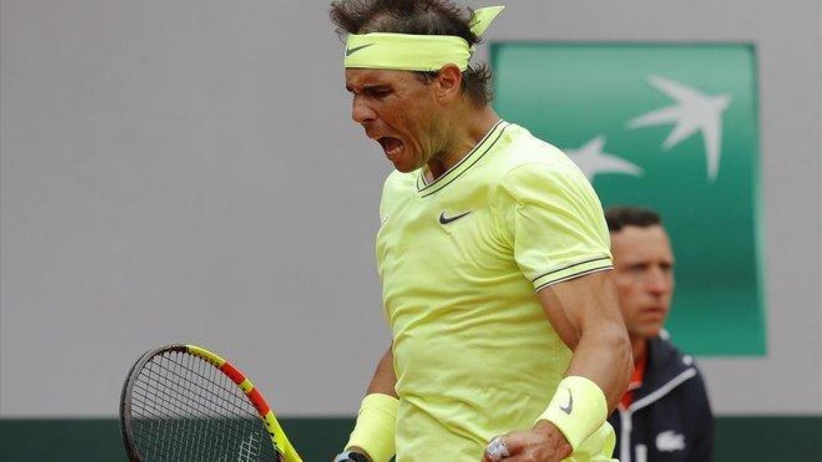 Rafa Nadal celebra la conquista de un punto ante Federer.-