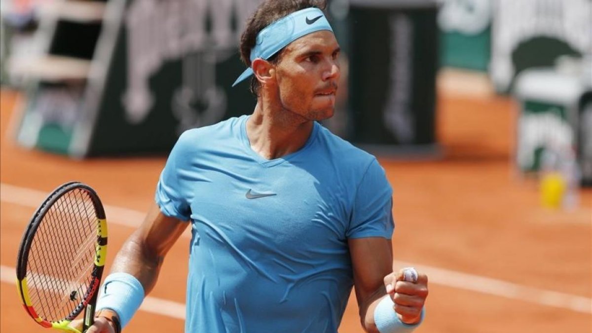 Nadal celebra un punto ante Schwartzman.-AP
