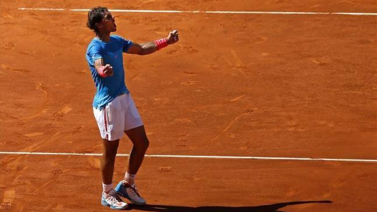 Nadal celebra el pase a la final de Madrid tras derrotar a Berdych.-Foto: AP / PAUL WHITE