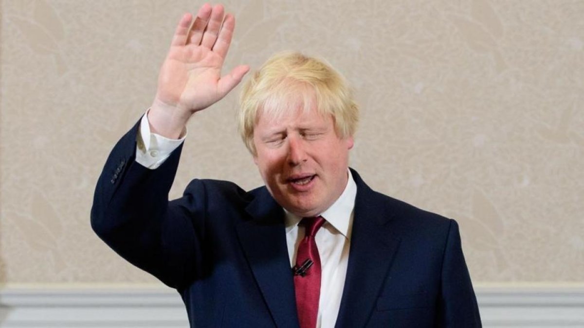 Boris Johnson durante su comparecencia en Londres.-AFP / LEON NEAL