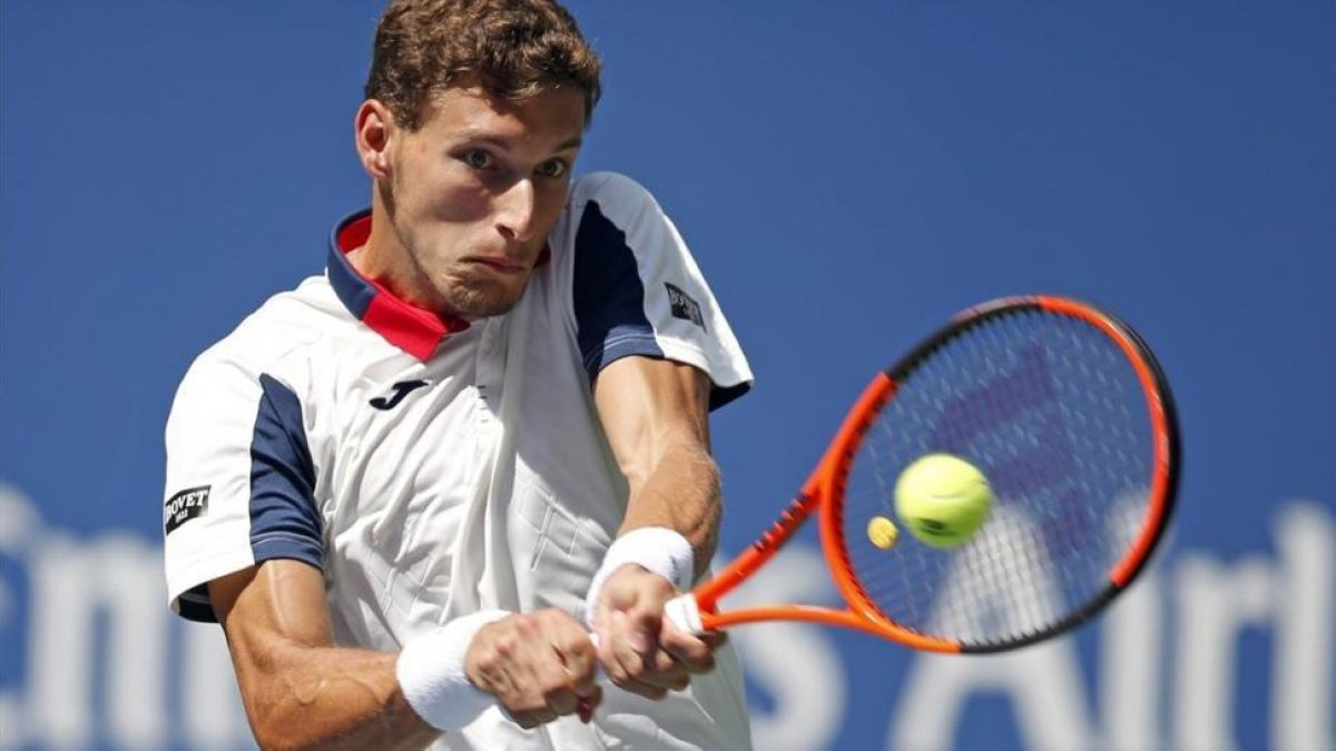 Carreño devuelve un revés, durante su partio contra Schwartzman.-/ JASON DECROW (AP)