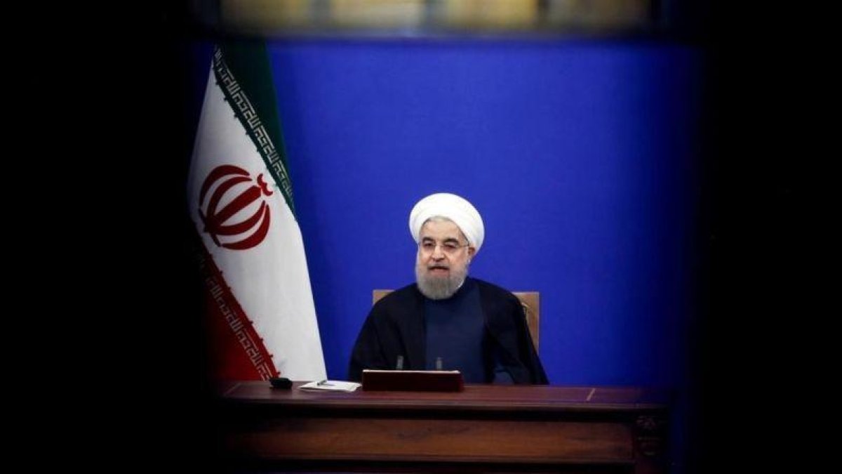 El presidente iraní, Hasán Rohaní, durante la entrevista televisiva tras la implementación de nuevas sanciones.-ATTA KENARE (AFP)