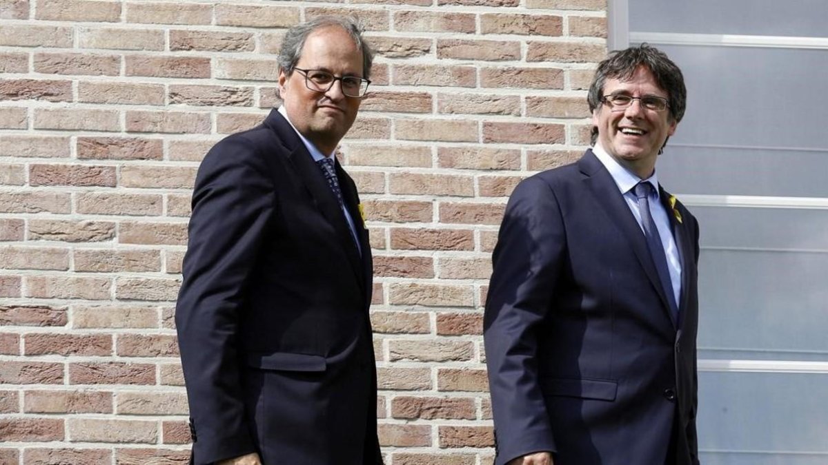 Carles Puigdemont y Quim Torra, el pasado 28 de julio.-NICOLAS MAETERLINCK (AFP)