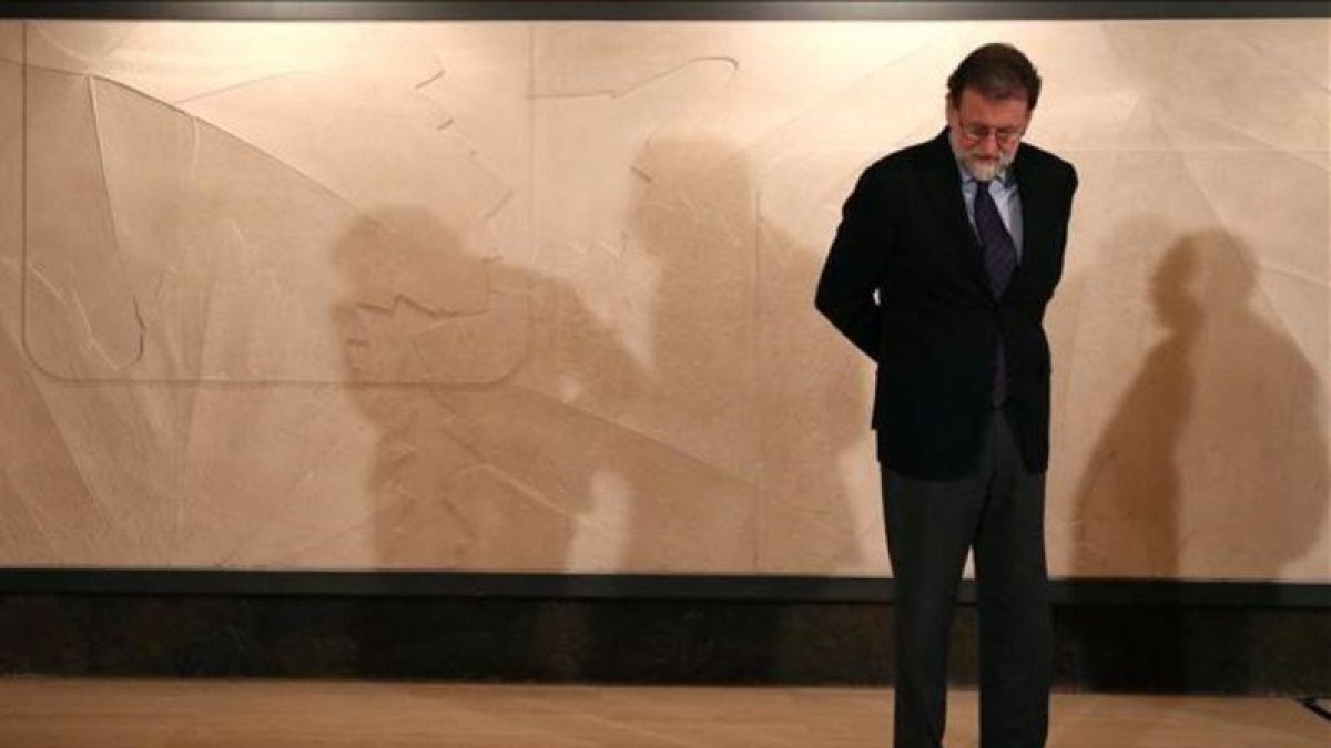 Mariano Rajoy, en la sede de Freixenet.-ALBERT GEA (REUTERS)
