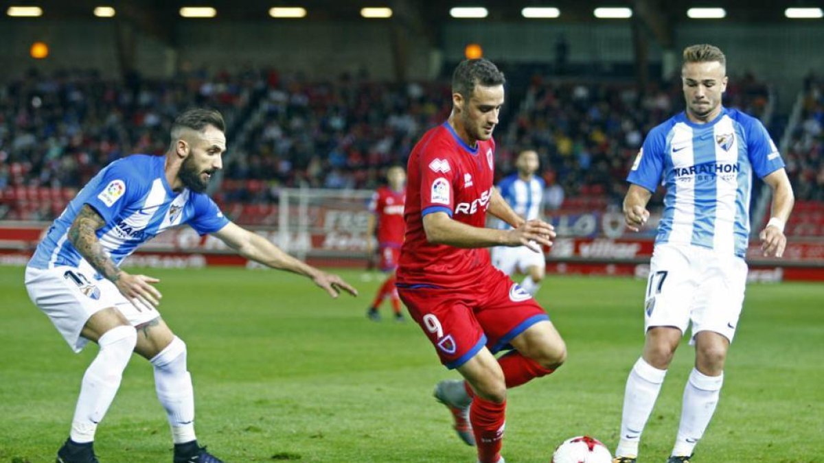 Higinio en el encuentro de Copa del Rey ante el Málaga junto a los visitantes Cifu y Ontiveros.-Mario Tejedor